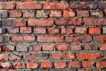Old dilapidated brick wall - background