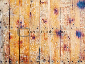 Wall covered with old scratched boards