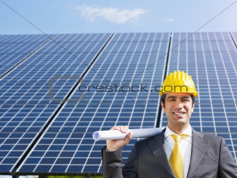 businessman and solar panels
