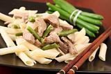 Penne rigate with pork and green beans