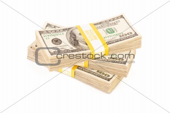 Stacks of Ten Thousand Dollar Piles of One Hundred Dollar Bills Isolated on a White Background.