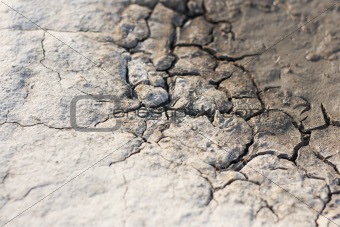 earth, sand in the crevices of drought, the background