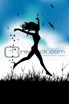 Young woman running on summer meadow