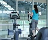 people running on threadmill at fitness club