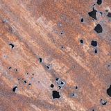 Iron sheet with rust and through holes