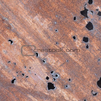 Iron sheet with rust and through holes