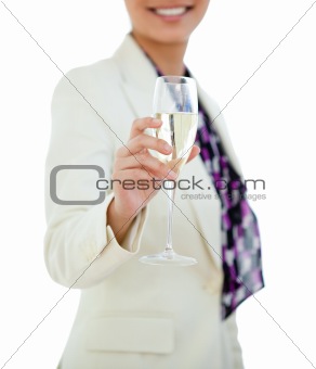 Close-up of a businesswoman holding a glass of Champagne