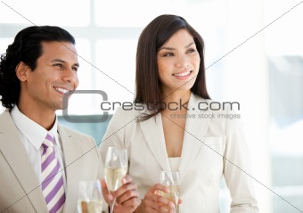 Successful business people drinking Champagne 