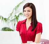 Beautiful businesswoman working at a computer