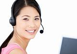 Smiling businesswoman with headset on 