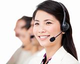 Confident business people with headset on standing