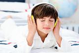 Cute boy listenning music