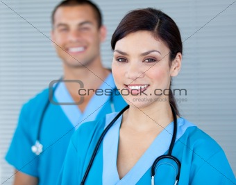 Bright female doctor looking at the camera