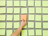 Hand and Adhesive Notes
