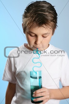 Child drinking through a straw