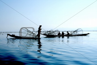 fishermen on water