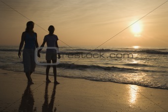 Mom and daughter at sunrise.