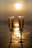 Champagne glasses with sunset.