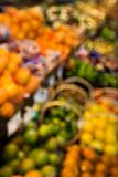 Blurred produce at grocery store.