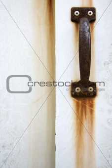 Detail of rusted door handle.