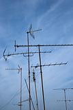 Antennas against blue sky.