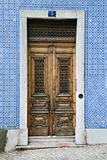 Exterior doors and tiled building in Lisbon, Portugal.