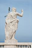 Roman statue with blue sky in Rome, Italy.