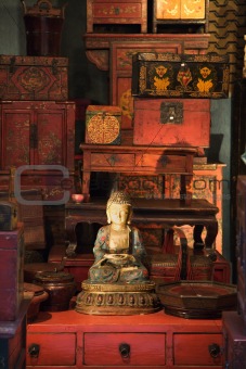 Buddha statue in antique store.