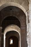 Arched walkway in Rome, Italy.