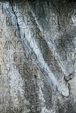 Script in stone at Roman Forum in Rome, Italy.
