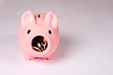 Piggy bank with open mouth and coins inside. Easy to cut.