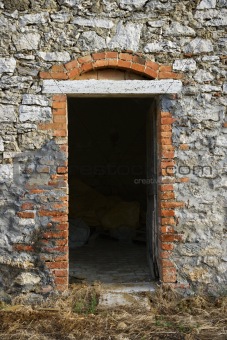 Doorway into old stone building in Tuscany, Italy. 