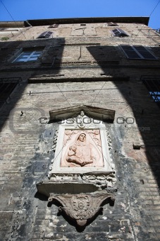 Outdoor relief of Virgin and Child.