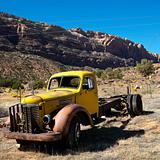 Old abandoned truck in desert.