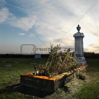 Tombstone memorial in rural cemetary.