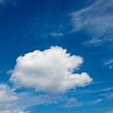 Cumulus cloud in blue sky.