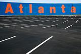 Empty parking lot with Atlanta painted on wall in Atlanta, Georg