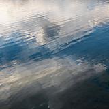 Reflections of clouds on water.