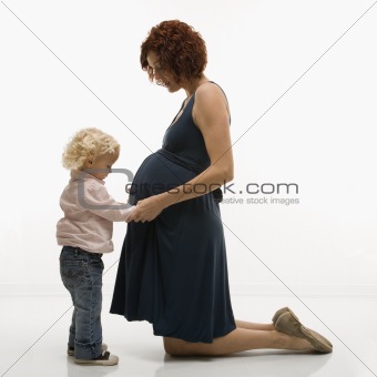 Touching Photo of Pregnancy Moments Young Expectant Mother with Socks on  Her Belly Stock Image - Image of body, expecting: 235027335