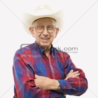 Portrait of elderly man in cowboy hat.