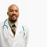 African-American man doctor smiling.