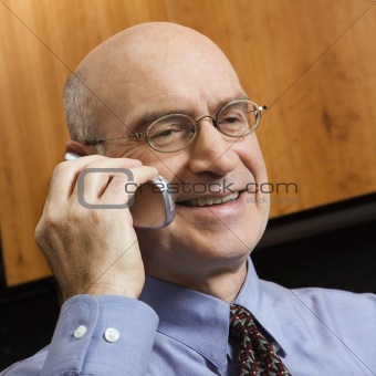 Caucasian businessman on cellphone.