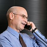 Caucasian businessman on telephone.