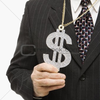 Businessman wearing dollar sign.