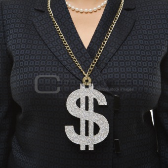 Businesswoman wearing dollar sign.