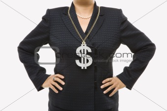 Businesswoman wearing dollar sign.