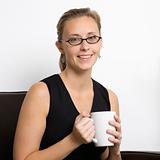 Caucasian woman portrait with coffee cup.
