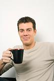 Caucasian male portrait with coffee cup.