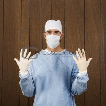 Young Man Courier In Protective Face Mask, Medical Gloves, Santa