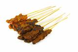 Grilled Meats Skewered on Bamboo Sticks